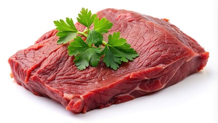 A close up of a raw beef roast decorated with parsley sprigs