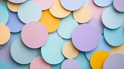 Abstract background of overlapping pastel color circles in shades of pink blue yellow and purple creating modern design
