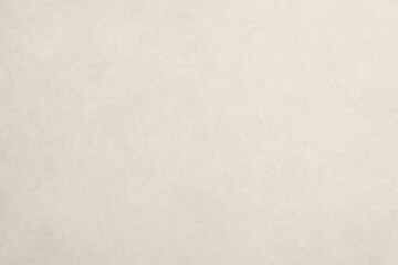 A minimalistic beige textured background suitable for various creative projects, featuring a subtle pattern that adds depth without overwhelming the design.