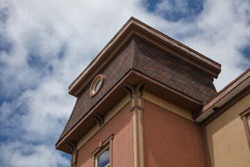 Vintage Building Corner with Tower and Round Window