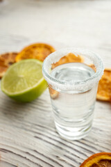 Fototapeta premium lime lemon and shot drink in close up