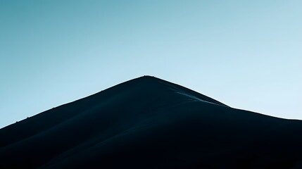 Majestic Mountain Peak Silhouette at Dawn