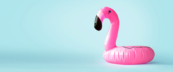 Pink flamingo ring on blue background,