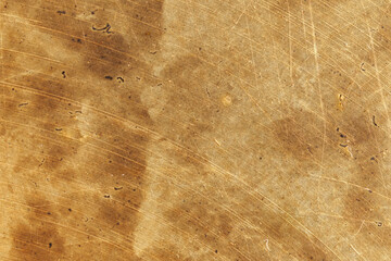 metal scratched texture in shades of golden brown,template,wallpaper,background for projects with spots and scratches