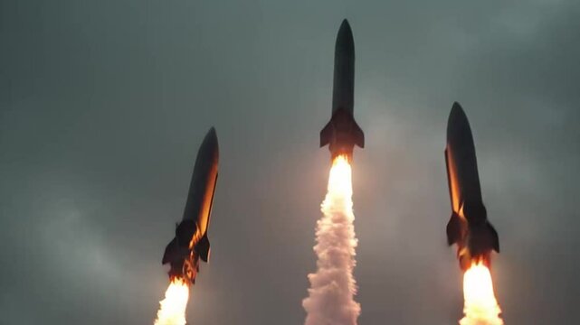 Three Military Missiles Launch Amid Flames and Smoke with Silhouetted Soldiers