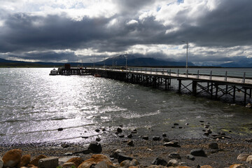 Fototapeta premium Puerto Natales is a city in Chilean Patagonia. It is the capital of both the Natales and the province of Última Esperanza Chile The seashort has a marvelous landscape with fjords and the Andes