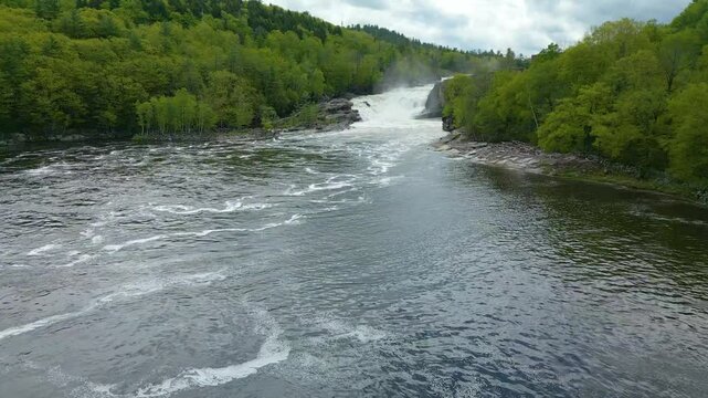 Aerial View of Hydroelectric Dam and Waterfall in Maine Forest, drone 4K