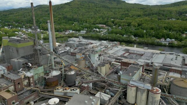 Aerial View of Industrial Paper Mill and Wood Processing Plant in Maine, drone 4k