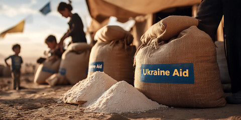 Ukraine Aid sacks of flour in dusty humanitarian zone with volunteers in background