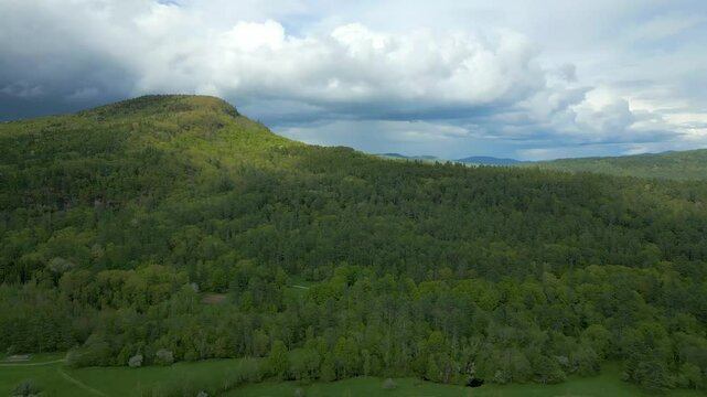 Lush Mountain Landscape Under Stormy Sky in Maine, drone 4K