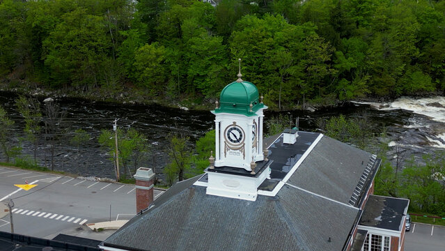 Aerial View of Historic Clock Tower and River in Small Town Maine