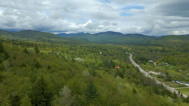 Aerial View of Scenic Mountain Road and Forest Landscape in Maine
