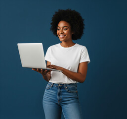 Full body young smiling happy black woman in casual clothes shirt white t-shirt hold use work on laptop pc computer look aside isolated on plain dark blue background studio. People lifestyle concept