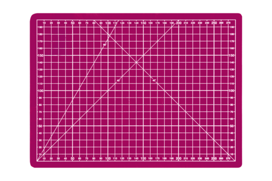 Pink cutting mat with white measurement grid and angle lines is isolated. Craft tool for precise cutting and design work.
