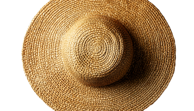 Woven straw sun hat on transparent background, top view. Fashion accessory and summer style concept