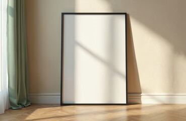 Minimalist black poster frame mockup leaning against wall. Shadow falls on wooden floor and wall. Light through window, green curtain. Modern, blank canvas for art print design.