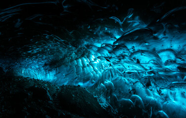 Stunning Blue Ice Cave in Icelandic Glacier with Natural Crystal Formations