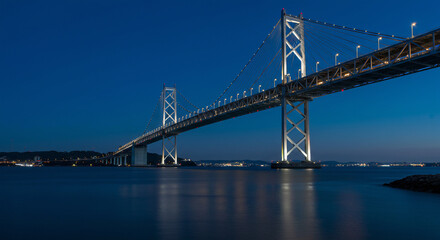 Fototapeta premium the Akashi Kaikyō Bridge in Japan during blue hour,