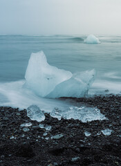 Diamond beach in Iceland with Ice Chunks on Black Sand and a Soft Magical Light