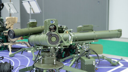 Advanced Weaponry Displayed at Military Exhibition Highlighting Modern Combat Capabilities and Technology Advancements in Weapons Systems