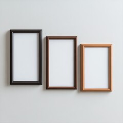Three Empty Picture Frames on a Minimalistic Wall Design Background