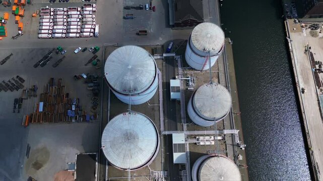12.5.25 Berlin De, Lng liquid Gas Tanks Storage. Smooth aerial view flight drone