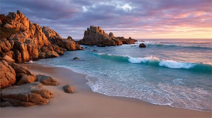 Obraz premium Sunset colors on a secluded rocky beach