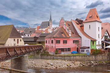 Riverside view of colorful houses and tower in Cesky Krumlov, Czech Republic