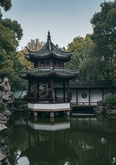 Naklejka premium Photo of Chinese Pavilion Reflecting in Tranquil Pond in Lush Garden