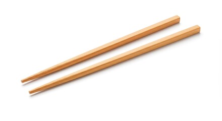 Obraz premium Isolated Pair Of Wooden Chopsticks On White Background Photo