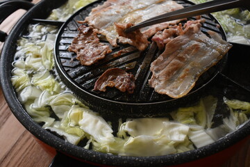 pork barbecue on frying pan, Thai style cuisine