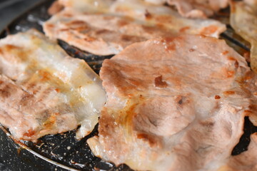 pork barbecue on frying pan, Thai style cuisine