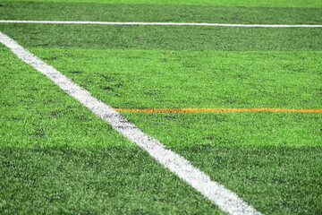 Obraz premium artificial green grass background for playground