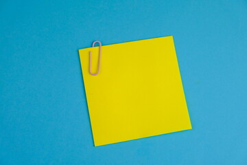 a blank note book on for text space. Educational and financial concept with text space on blue background.