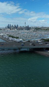 Vertical aerial rising shot of Auckland of New Zealand in daytime