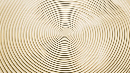 Obraz premium Circular concentric lines on a light beige surface.
