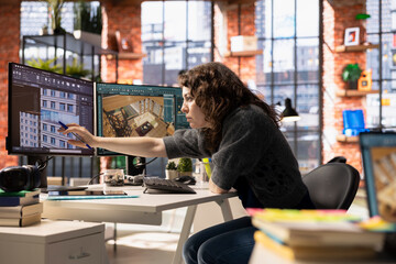 Woman uses architectural software on her PC to create a detailed 3D render of a home interior. The program allows to drag and configure furniture and other design elements for a virtual layout.