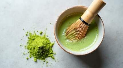 Traditional matcha tea preparation with bamboo whisk and green tea powder, zen tea ritual