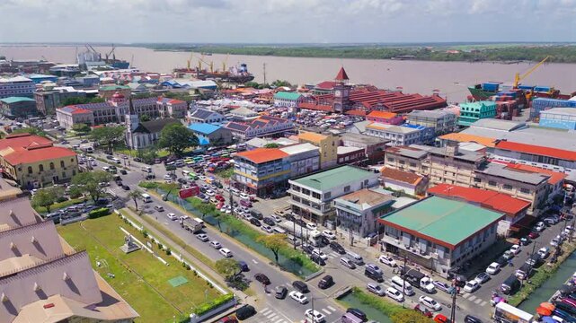Aerial of downtown Georgetown with Stabroek Market and Demerara River Guyana