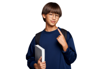 Studio photo of a happy young student with a confident smile, carrying a backpack and a book while making a pointing gesture