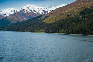 lake in snow covered mountains