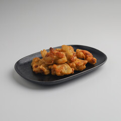 Banana fritters in a plate on white background