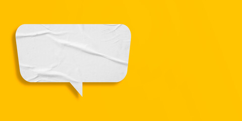 White speech bubble crumpled paper isolated on yellow background