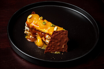 Sweet pastry layers with creamy caramel and nuts delight dessert lovers in gourmet style