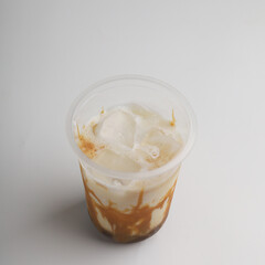Milk coffee in a cup on white background