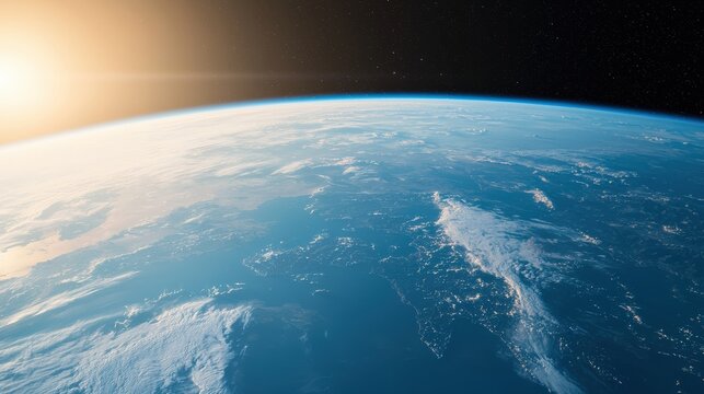 Breathtaking sunrise illuminates earth's atmosphere and surface from the vast expanse of space, showcasing the beauty and fragility of our planet