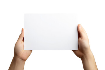Two hands holding a blank white rectangular card against a black background in a studio shot