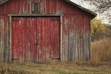 Rustic red barn with weathered wood siding