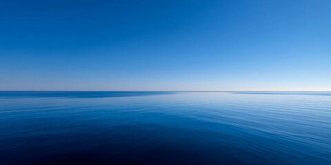 Obraz premium Tranquil expanse of a still ocean