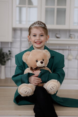  Happy Stylish Girl Hugging Large Teddy Bear Indoors